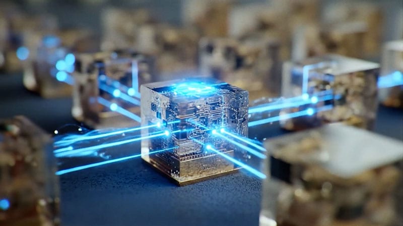 Glowing translucent cubes with internal circuitry connected by blue light beams.