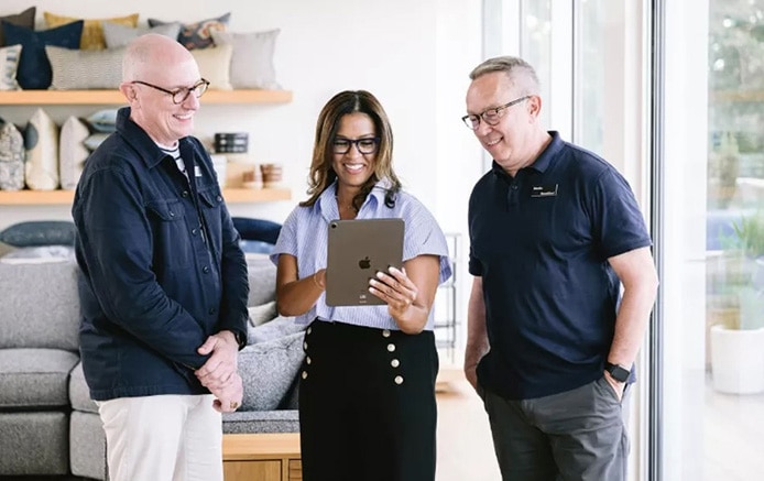 Room & Board associate assists customers